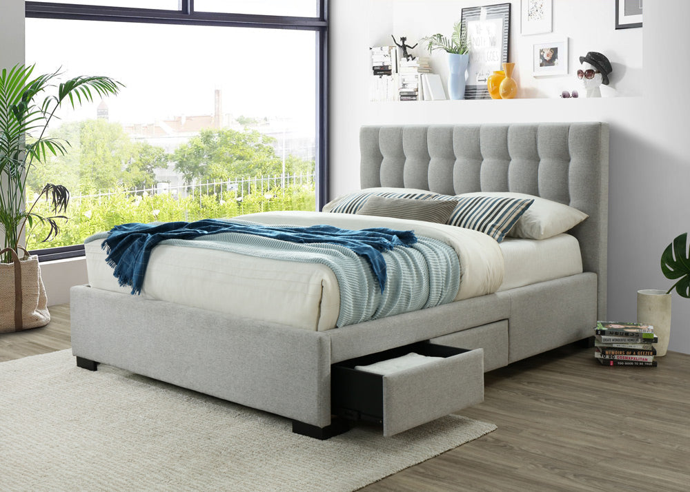 Upholstered bed with storage drawers